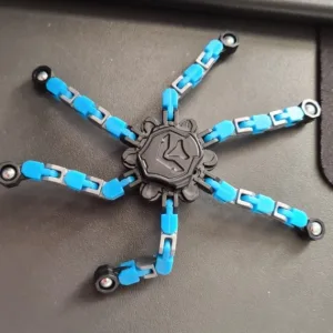 Asiakkaalta P***a saatu muuntautuva robotti fidget spinner.