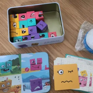 Asiakkaalta N****a saadut Expression Puzzle Building Blocks -pelin palikat kellolla.